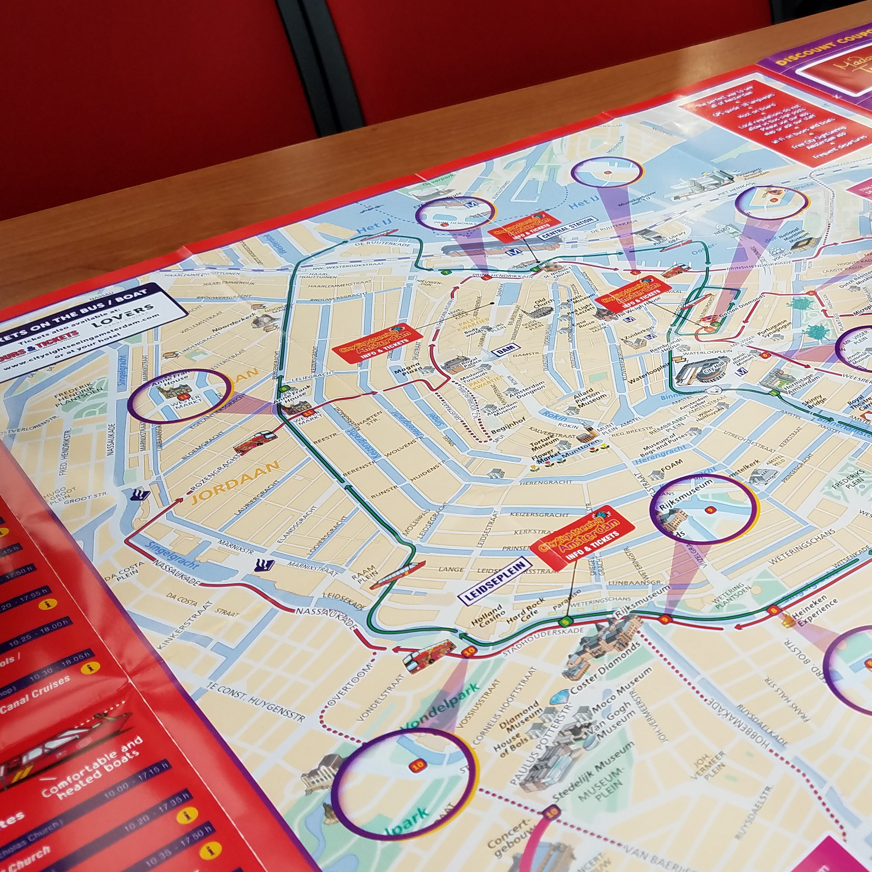 Historic buildings lining a street in Amsterdam.