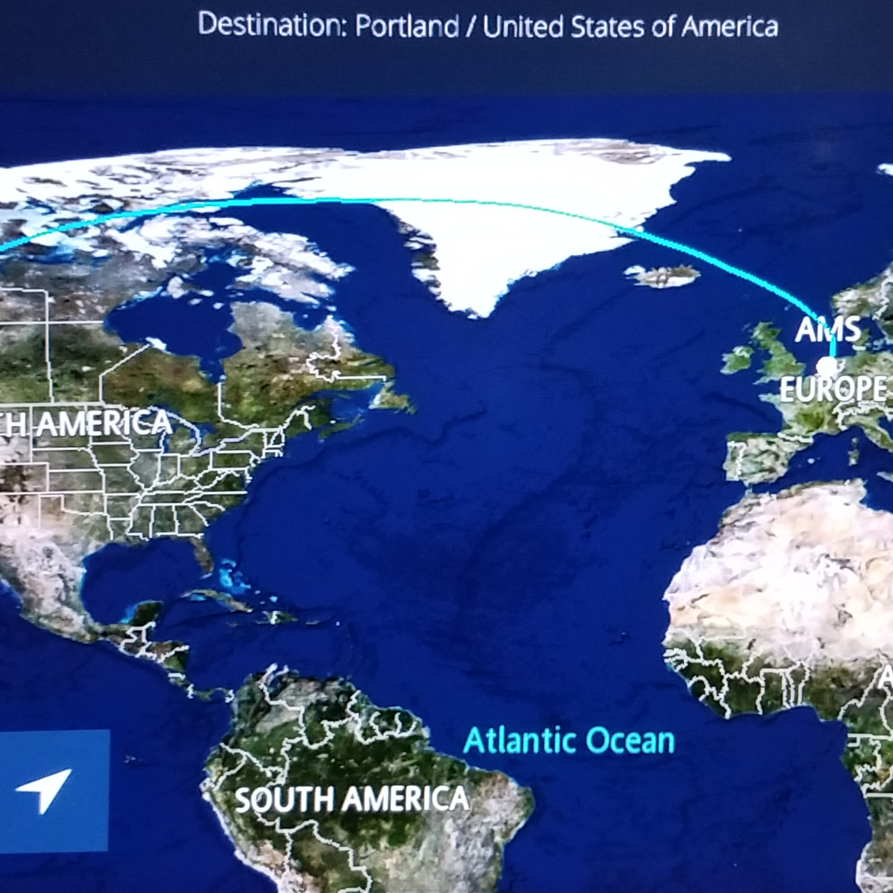 Traditional buildings and a waterside scene in the Netherlands.