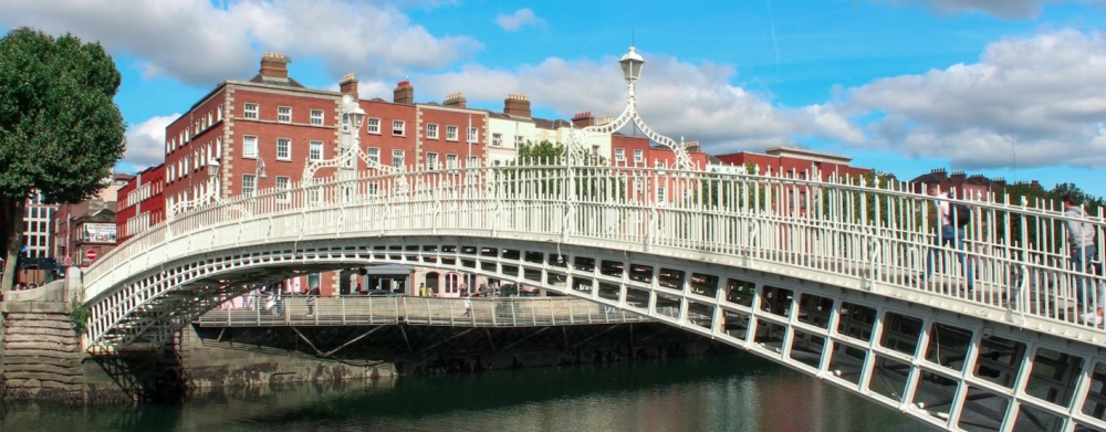 The Ha'penny Bridge crossing the River Liffey in Dublin.